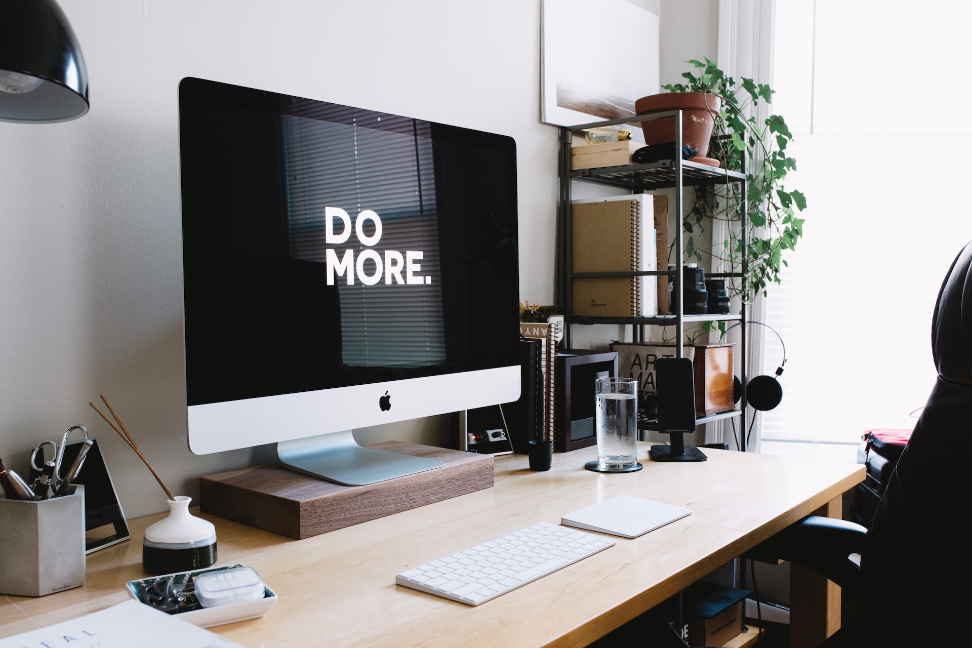 Photo of apple mac saying do more on the screen